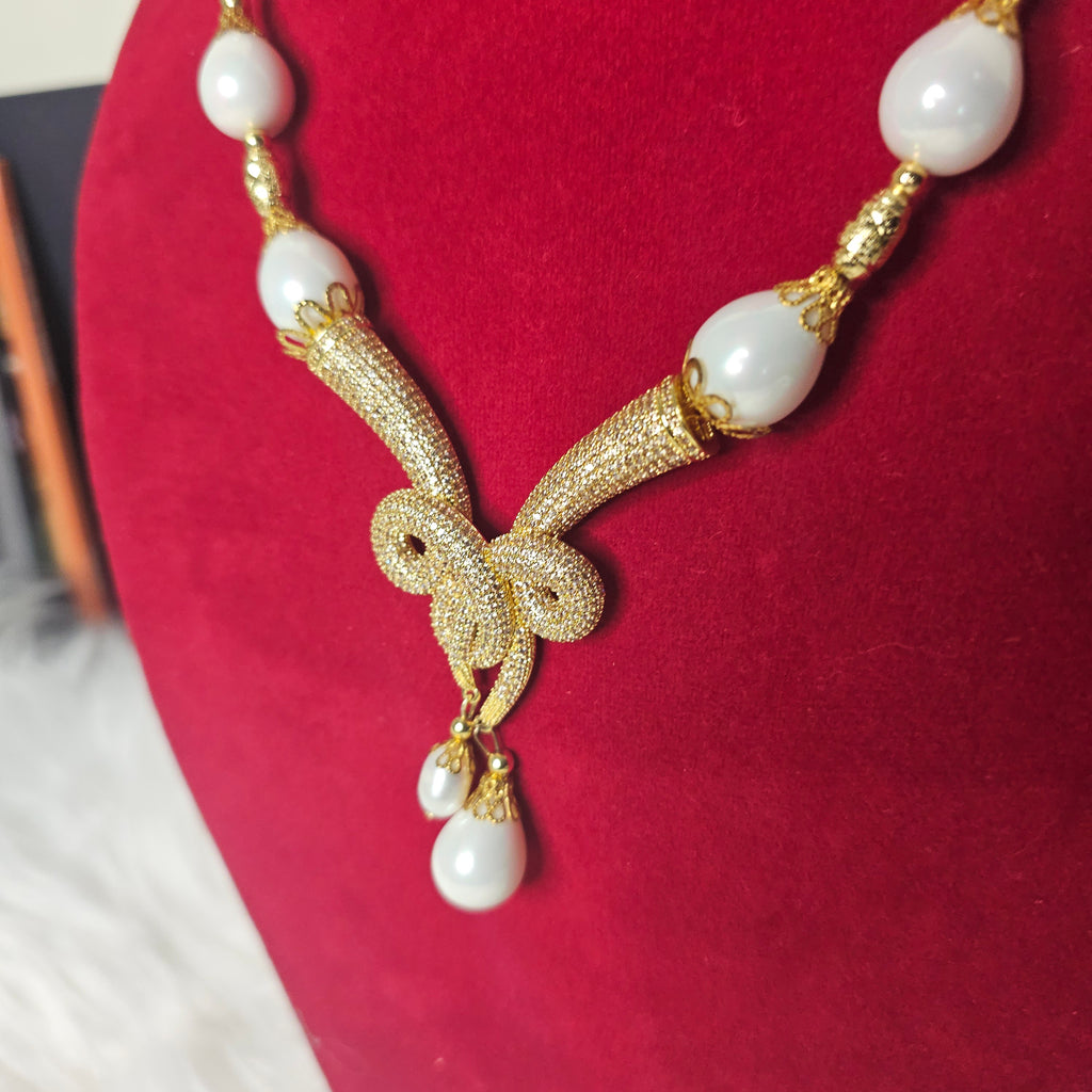 Gold Necklace with White Pearls